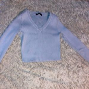 Size S the brand is Brandy Melville has only been worn once color sky blue